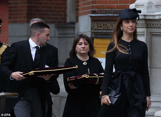 Lady Marina Charlotte Windsor (right) arrives at Westminster Cathedral in London today