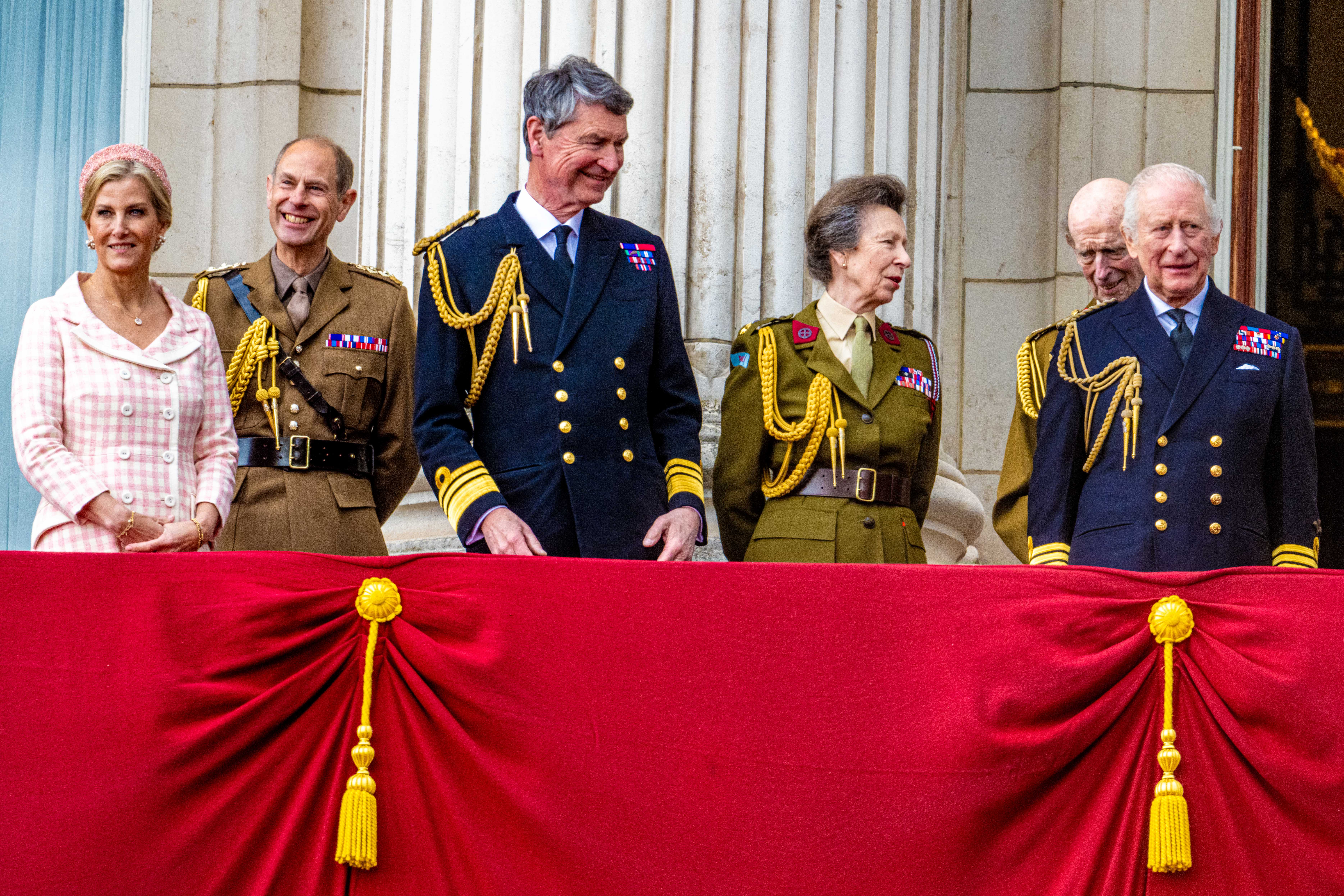 Sir Timothy on balcony with royal family