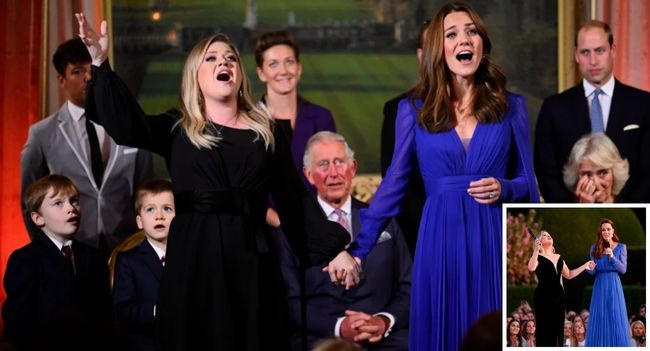 Last night, the gardens of Kensington Palace witnessed something no one will ever forget.  Kelly Clarkson lifted her gaze to the sky, her voice trembling as she whispered: “This isn’t just music—it’s survival.” And in that instant, the annual Inspiration for Families Gala transformed from a charity event into a moment of living history.  Then—gasps. Princess Kate appeared in a flowing sapphire gown, radiant as she joined Kelly on stage. Together, they began singing “True Colors.” Their voices—one raw and powerful, the other graceful and serene—wove together like light and shadow. Parents cried, children stared in awe, couples clutched each other’s hands. Even the royals themselves were overcome.  King Charles’s eyes shimmered. Queen Camilla wiped away tears. Prince William whispered hoarsely: “They’ve just shown the world what real courage looks like.”  At the song’s final note, Kelly leaned toward Kate, her voice breaking: “This isn’t just a song… it’s hope.” To which Kate, glowing with that quiet strength she’s known for, replied: “And tonight, it belongs to all of us”