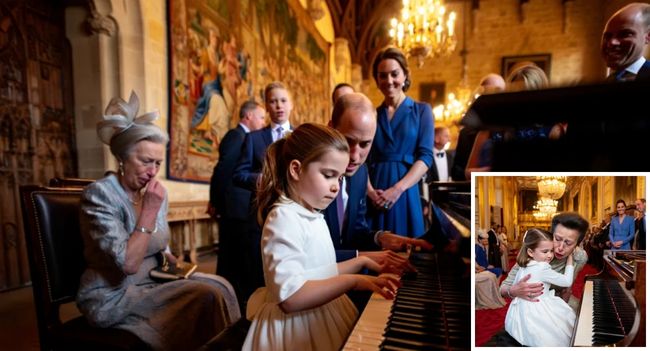 THE ROYAL MOMENT NO ONE WILL EVER FORGET. Inside the gilded halls of Windsor Castle, during what was meant to be a formal 75th birthday celebration for Princess Anne, something extraordinary happened. Known as the monarchy’s stoic, hardest working royal, Anne — the woman who rarely shows emotion — was suddenly left speechless… and in tears. Her young niece, Princess Charlotte, quietly rose from her seat in a simple white dress, her hair tied back. Without a word, she walked to the piano. And then… magic. 🎶  Charlotte began to play a haunting melody she had secretly practiced for weeks. The room fell utterly silent. Even the chandeliers seemed to listen. As the delicate notes filled the hall, Prince William leaned toward Catherine and whispered words that sent shivers through everyone nearby: “Diana would have loved this”
