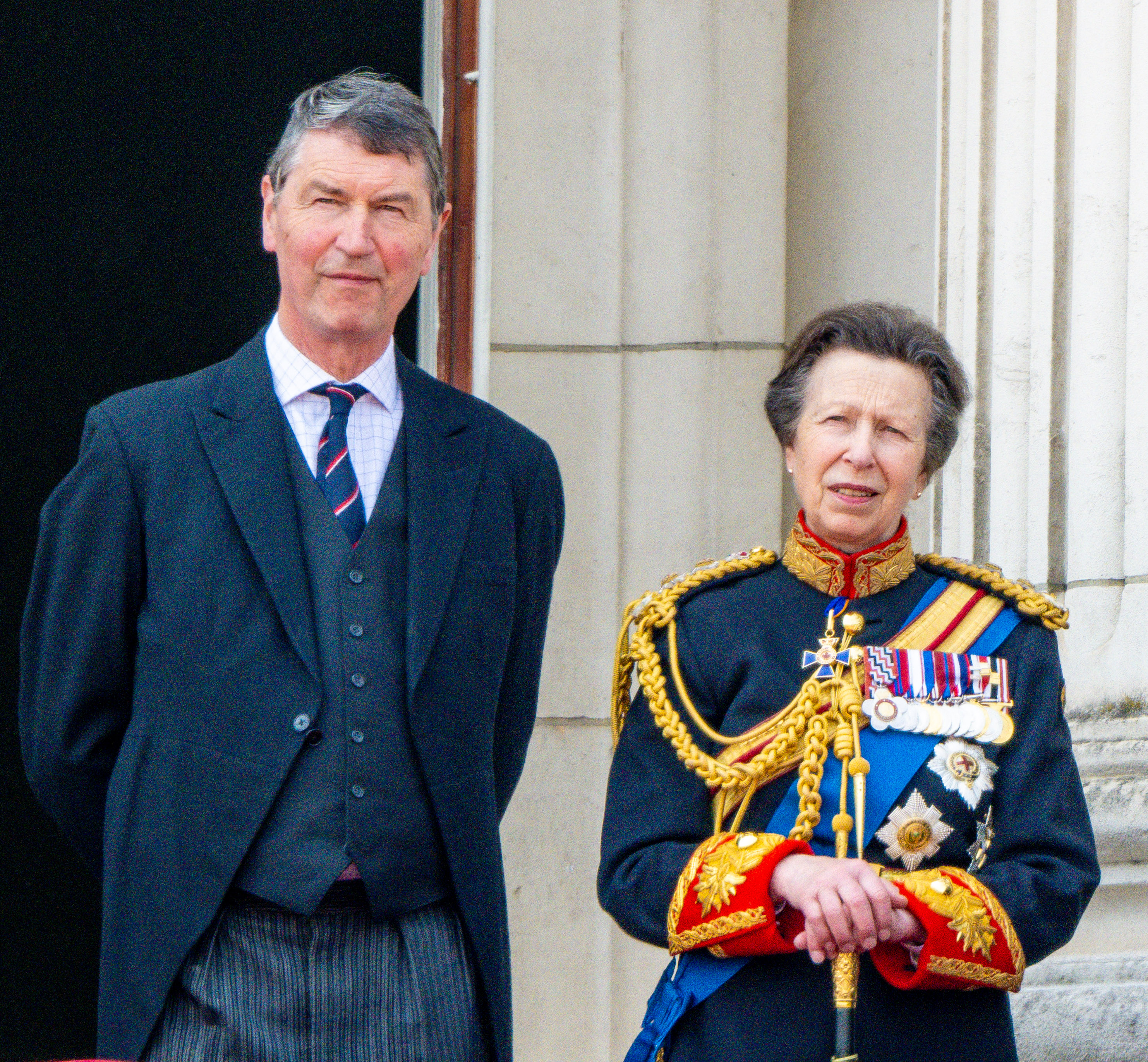 Sir Timothy and Princess Anne on palace balcony