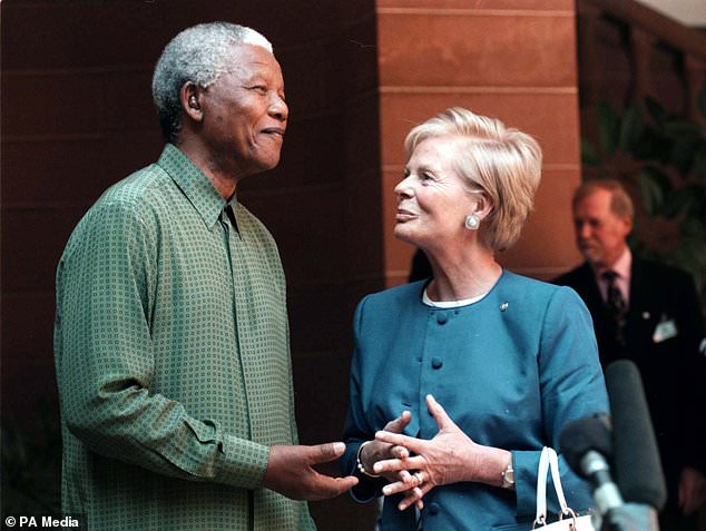 The Duchess of Kent with Nelson Mandela during her visit to South Africa as patron of the UK Committee for Unicef in 1997