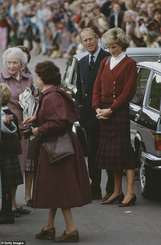 Philip and Diana are pictured as they are greeted by Ruth, Lady Fermoy, Diana's grandmother, upon arrival in Scrabster, Scotland, in August 1985