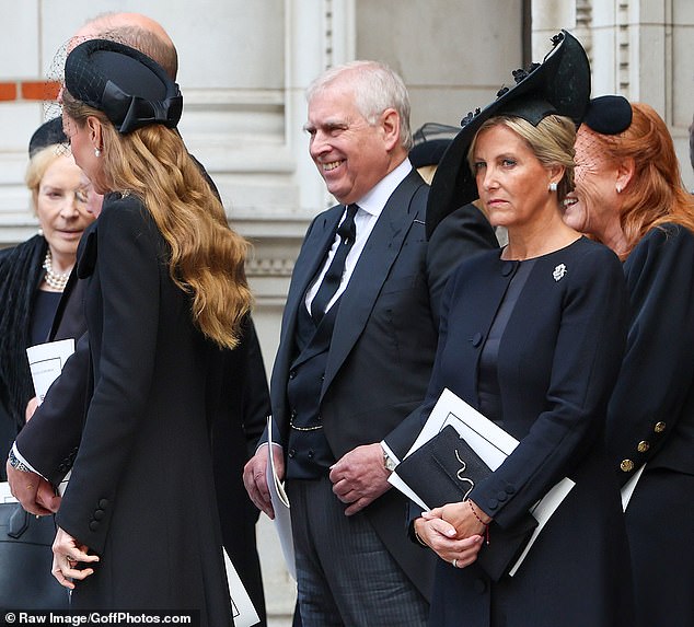Andrew and Fergie smile while a sombre looking Sophie, the Duchess of Edinburgh, looks outside Westminster Cathedral