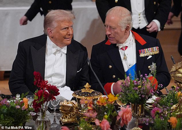 US President Donald Trump sits next to King Charles at the state banquet at Windsor Castle