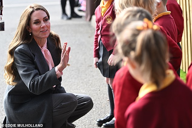 The Princess of Wales appeared keen to talk to the children waiting at the Southport school