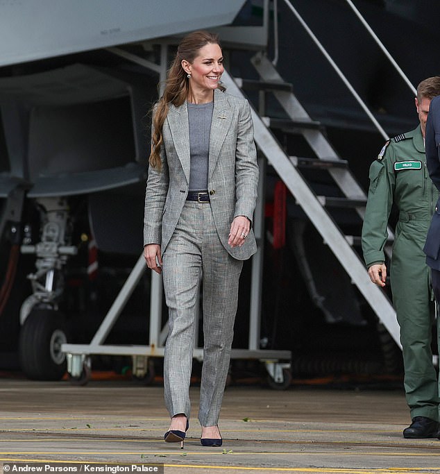 The Princess of Wales impressed onlookers with her 'natural' skills as she took to a virtual flight simulator at RAF Coningsby today - and even revealed her son Prince Louis 's sky-high ambitions