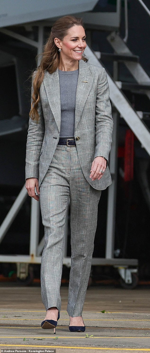 The Princess of Wales impressed onlookers with her 'natural' skills as she took to a virtual flight simulator at RAF Coningsby on Thursday - and even revealed her son Prince Louis's sky-high ambitions