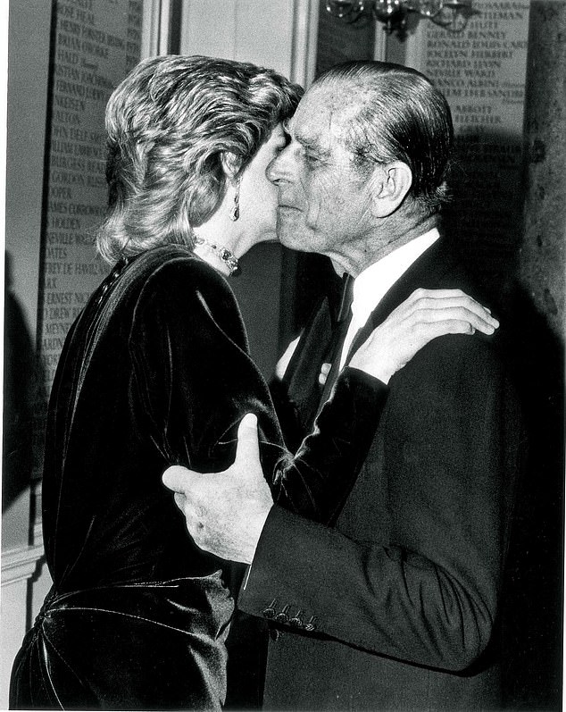 Prince Philip greets Princess Diana at a dinner at the Royal Society of Arts in London in 1986