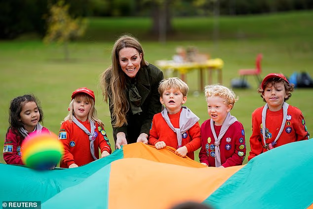The Princess of Wales plays with children at Frogmore Gardens in Windsor today