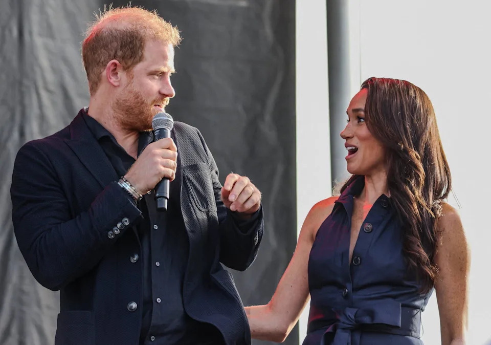 Meghan Markle Trolled Over 'Needy And Clingy' PDA With Prince Harry During  Festival Appearance