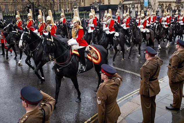 Captain Lizzie Godwin leads the sovereign's escort during the King's coronation