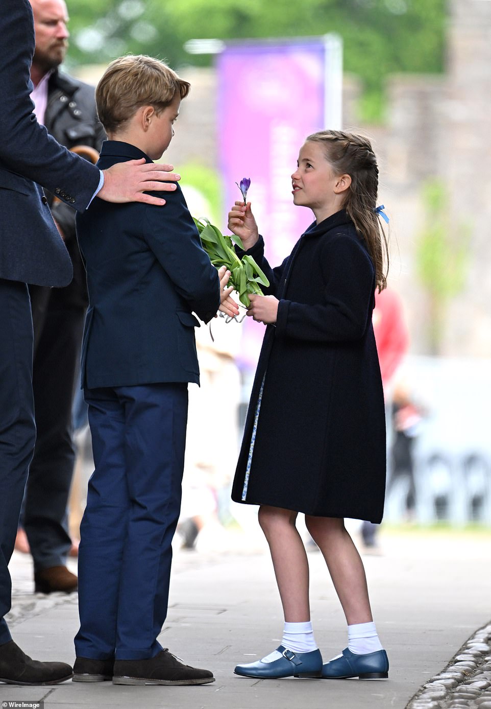 Sweet moment Princess Charlotte presents Prince George with a bloom during  their visit to Cardiff | Daily Mail Online