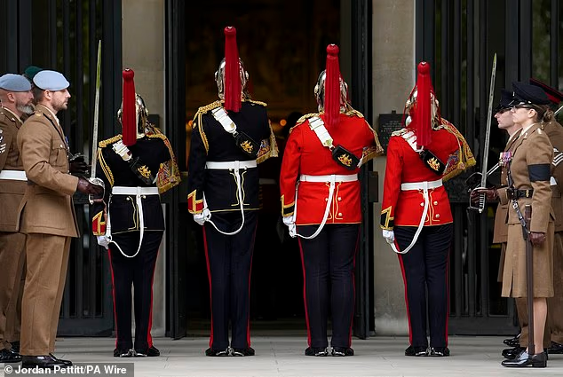 Military buglers at the funeral for Captain Elizabeth Godwin, at the Guards Chapel, Wellington Barracks, London