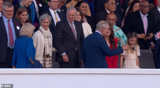 The Princess of Wales and her daughter, Princess Charlotte, are pictured curtseying to King Charles as he walked past them in the royal box