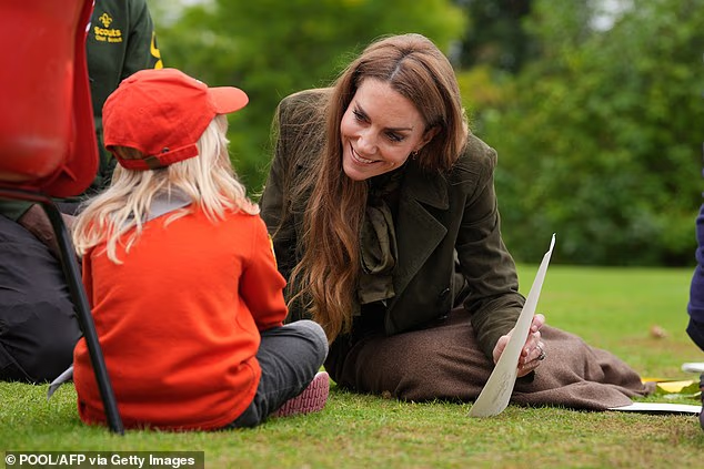 Kate smiled as she looked at a picture made by one of the young Squirrel Scouts