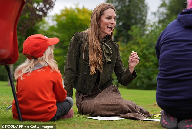 Kate appeared excited to be spending the morning outside with the young scouts