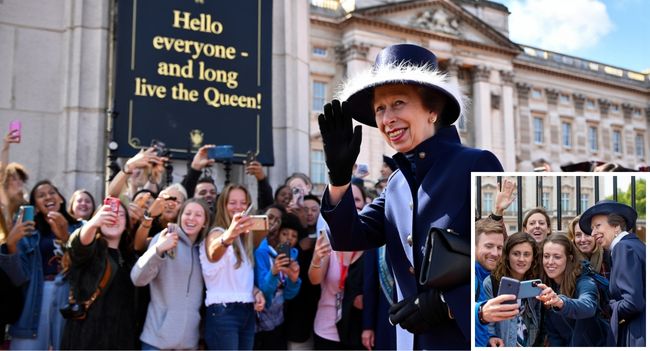 ROYAL PHOTO-BOMB ALERT! Imagine traveling all the way to London for that perfect Buckingham Palace shot… only to have it hilariously interrupted by Princess Anne herself! That’s exactly what happened to a group of American tourists when Anne suddenly walked into their photo outside the palace gates. But instead of apologizing or stepping aside, the Princess leaned in with her trademark wit and shouted: “Hello everyone – and long live the Queen!”. The stunned tourists burst into laughter, phones flew into the air for selfies, and within hours the photo went VIRAL worldwide. Fans online are calling it “the most iconic royal photobomb of all time.” Memes are everywhere, captions are rolling in, and Princess Anne is being praised once again as the royal family’s no-nonsense, unapologetically real wild card