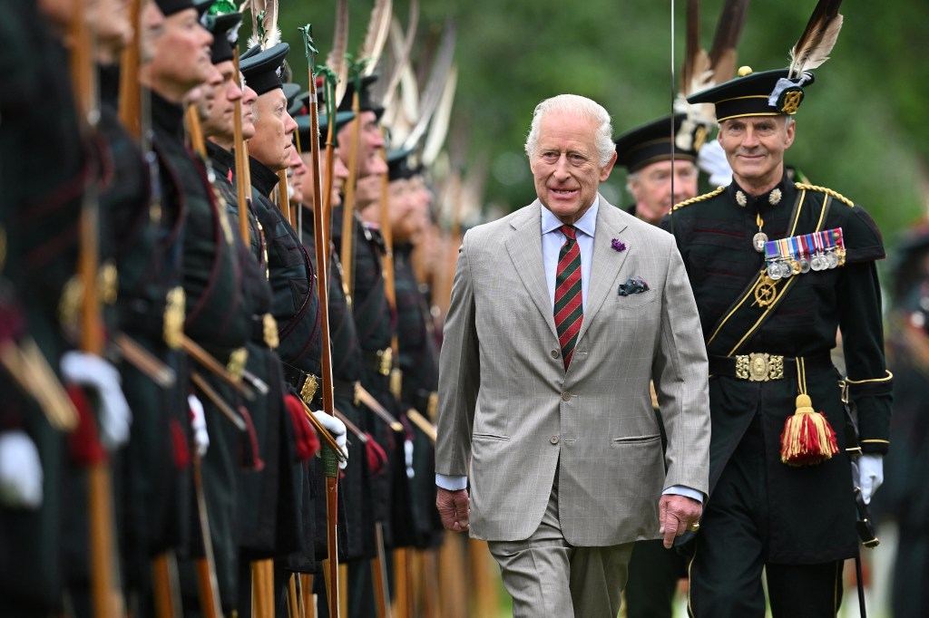 King Charles III inspects a Guard of Honour formed by Members of Royal Company of Archers during the traditional Ceremony of the Keys.