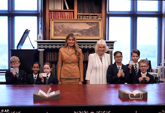 Melania Trump and Queen Camilla visit the Royal Library at Windsor Castle this morning