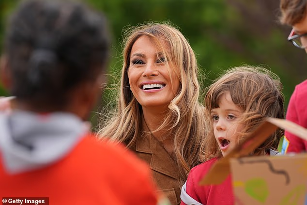 Melania appeared animated as she took part in the children's art projects today