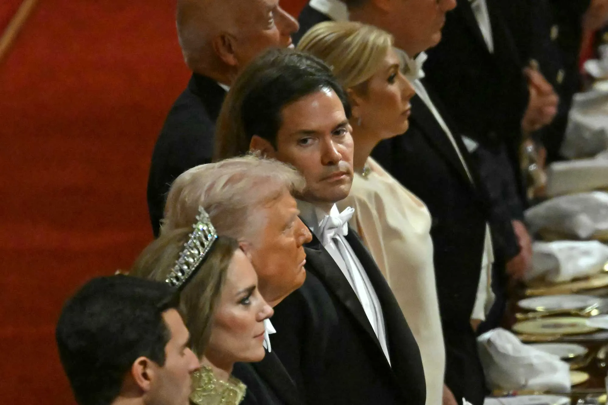 US Secretary of State Marco Rubio (C) glances toward US President Donald Trump at a State Banquet at Windsor Castle, in Windsor, on September 17, 2025,