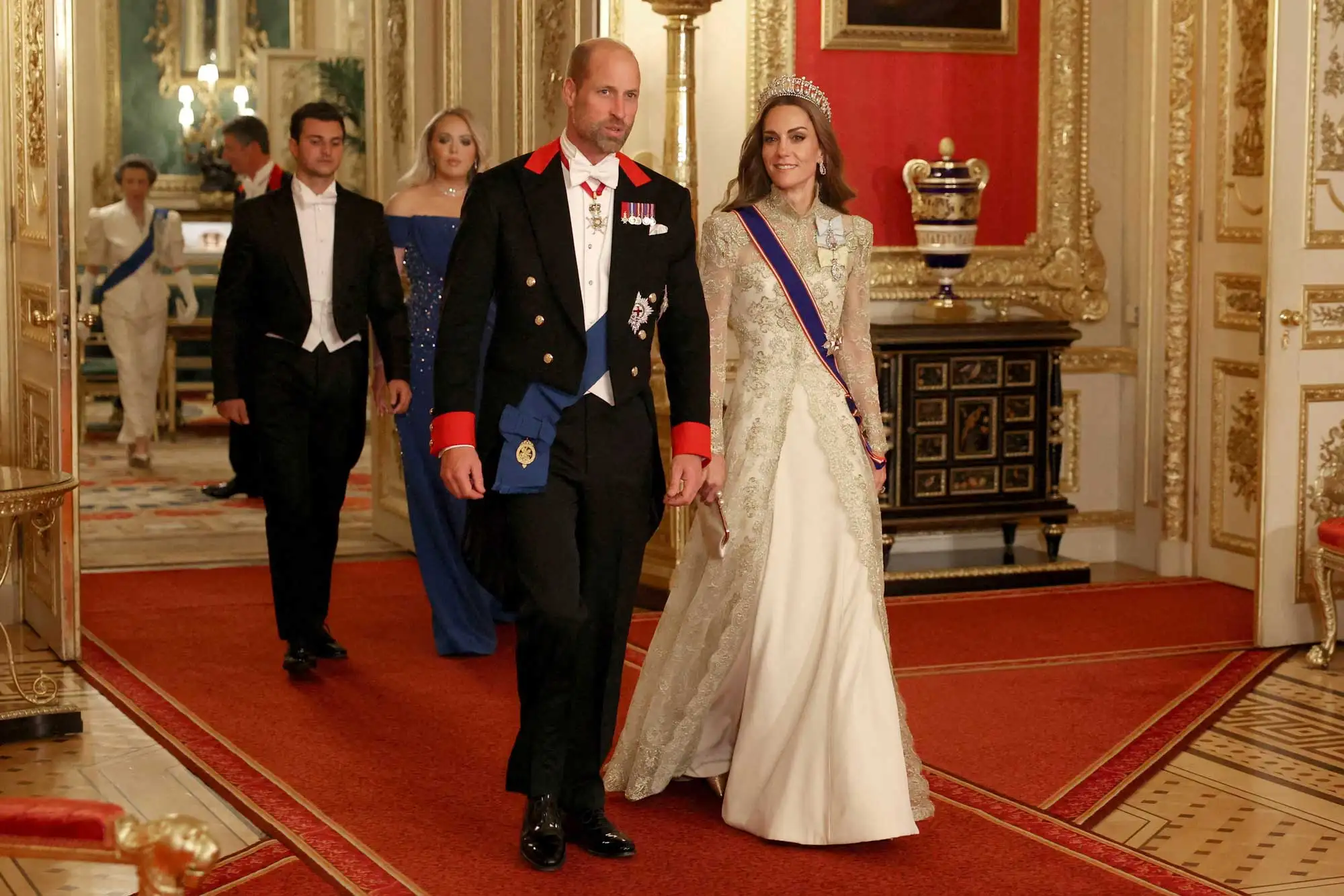 Britain's Prince William, Prince of Wales and Britain's Catherine, Princess of Wales arrive to attend a State Banquet at Windsor Castle, in Windsor, on September 17, 2025