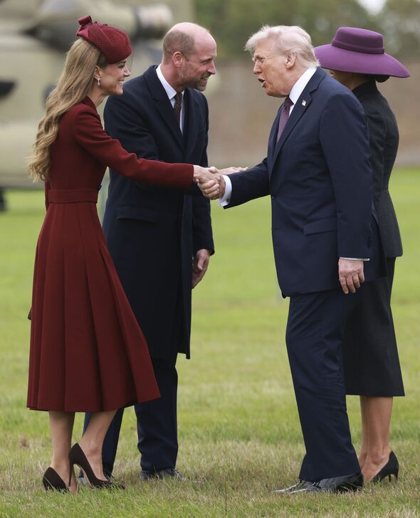Prince William and Princess Kate shaking hands with Trumps