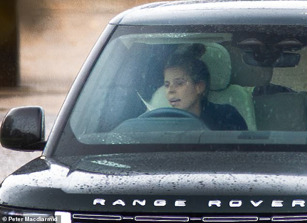 Princess Beatrice drives from Royal Lodge, home of her father Prince Andrew and mother Sarah Ferguson, at Windsor in Berkshire on Monday