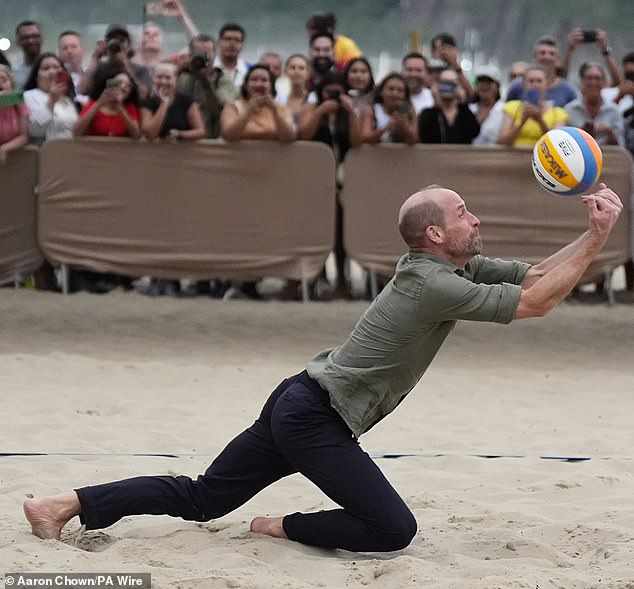 Wild about Wills! Prince is mobbed by VERY handsy Brazilian royal fans after setting pulses racing with his physique during beach volleyball | Daily Mail Online