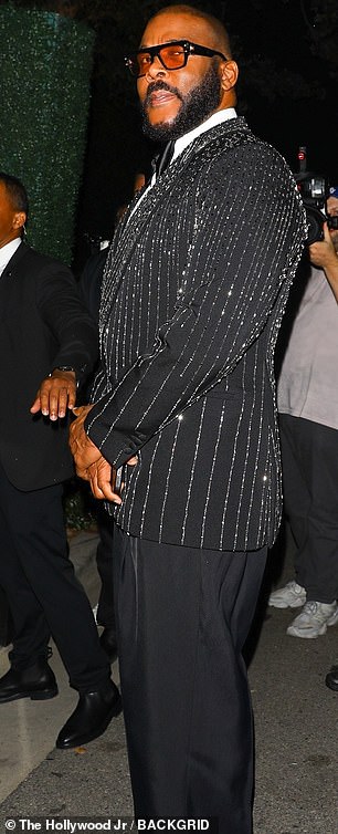 Tyler Perry made his presence felt in a suit that included a sparkling pinstriped jacket