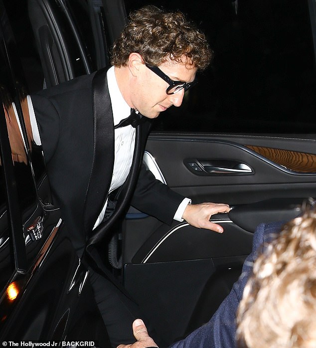 Mark opted for traditional elegance in a snappy tuxedo with a matching black bow tie