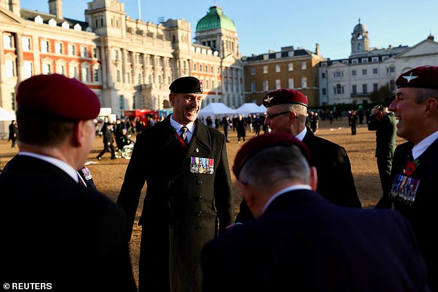 Veterans gather on Horse Guards Parade ahead of the Royal British Legion's march past the Cenotaph on Remembrance Sunday