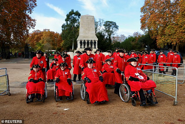 The Chelsea Pensioners arrive on Horse Guards Parade ahead of the Sunday service