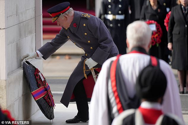 King Charles lays down a wreath during the Remembrance Sunday Service at the Cenotaph