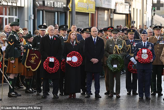Northern Ireland Secretary Hilary Benn, Head of the Northern Ireland Civil Service Jayne Brady and Taoiseach Micheal Martin during a Remembrance Sunday service at the Cenotaph in Enniskillen