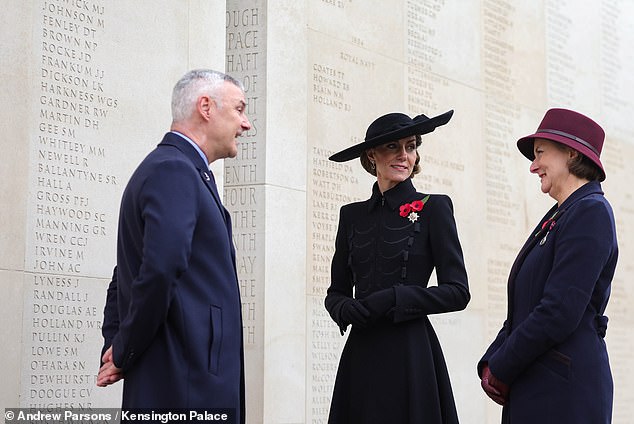 Kate is invited to view newly-dedicated names inscribed on the memorial wall