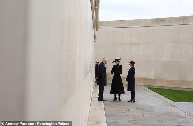 The Princess is invited to view newly-dedicated names inscribed on the memorial wall