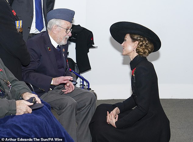 The Princess of Wales speaks to 101-year-old veteran Alan Kennett at the service in Alrewas, Staffordshire