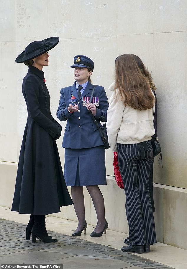 Princess Catherine speaks to other participants at the Service of Remembrance in Alrewas