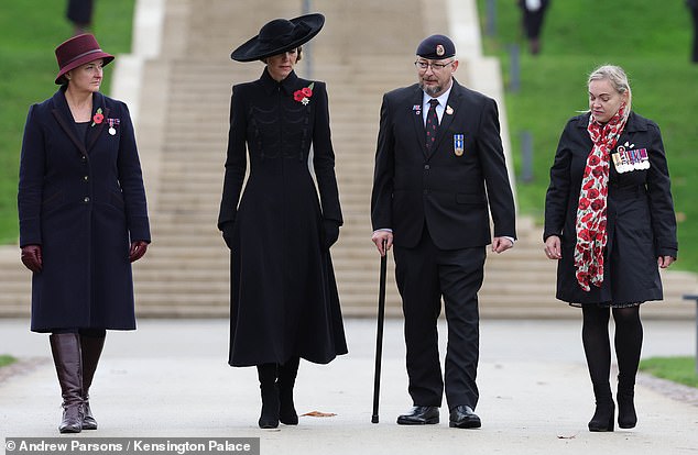 Her Royal Highness walks through the grounds of the National Memorial Arboretum this morning
