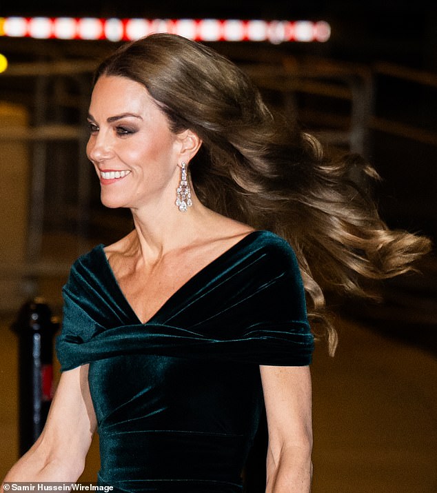 Kate put her best fashion foot forward in an emerald velvet frock paired with diamond earrings