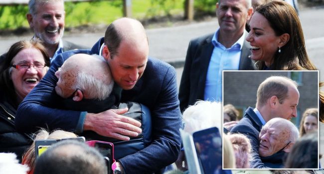 “Sometimes, compassion breaks protocol.”  It was meant to be a routine royal engagement — but what happened next in Glasgow ’22 became one of the most unforgettable moments of Prince William’s public life.  As he met locals outside a community outreach center, one elderly man — Mr. Burns, a grandfather of 25 — stepped forward to share his story. He spoke softly of his years of struggle with homelessness… and the unbearable grief of losing his wife. The crowd went silent. His voice trembled.  And then, in a moment that no one saw coming, Prince William set aside every royal rule. He stepped forward, reached out — and pulled the pensioner into a hug. For several seconds, the world seemed to stop. The two men held on tightly — one finding comfort, the other showing a kind of leadership no crown could ever define. It was raw, real, and profoundly human.  Witnesses said tears streamed down Mr. Burns’ face as he whispered his thanks. “He didn’t just listen… he felt my pain,” the man later said.  That simple act — one hug — spoke louder than any speech or title ever could