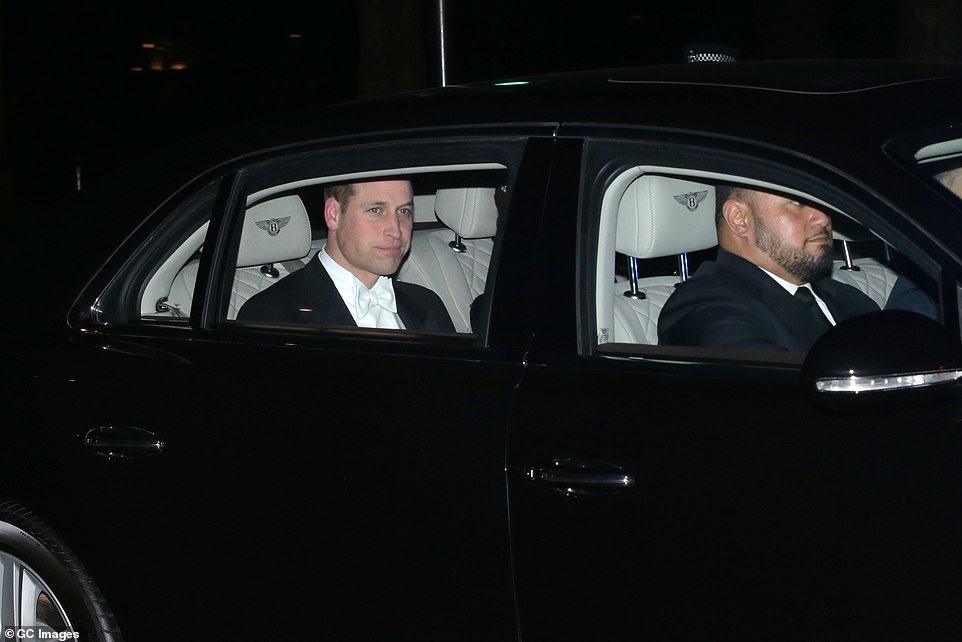 Prince William appeared relaxed as he and Kate made their way to the Diplomatic Reception at Buckingham Palace this evening