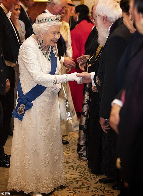The Queen wowed in a floor length Angela Kelly gown for the occasion, which she paired with her Grand Duchess Vladimir Tiara