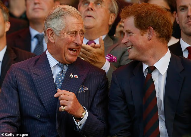 Charles, then the Prince of Wales and Prince Harry at the opening of the Invictus Games in 2014