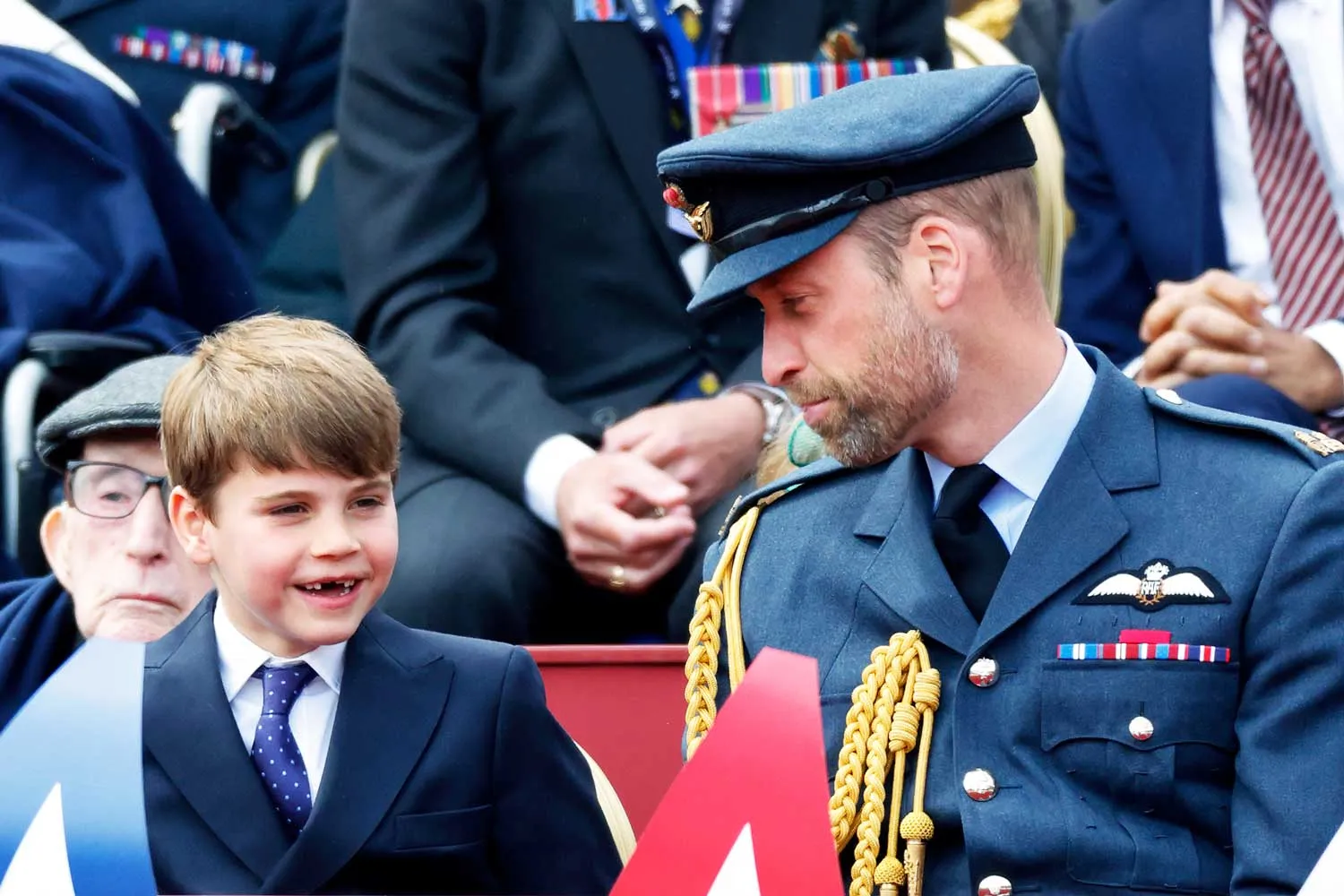 Prince Louis of Wales and Prince William, Prince of Wales attend a military procession, down The Mall