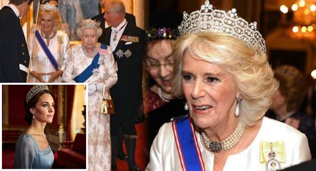 UNPRECEDENTED IN ROYAL HISTORY! Princess Catherine has just made a powerful statement at Buckingham Palace, stunning the royal world with her debut of a 100-year-old tiara that hasn’t been seen since the 1930s. Wearing the Strathmore Rose Tiara, a glittering diamond piece once worn by the beloved Queen Mother, Catherine brought a wave of nostalgia and elegance to the room, evoking the rich legacy of royal women who came before her, including Princess Diana. But the significance of this moment goes deeper than just a beautiful piece of jewelry. Many are asking: Was this a deliberate act of defiance against Queen Camilla’s new “crown rotation” rules — which have been limiting who can wear certain royal jewels? Catherine’s choice to wear this historic tiara, one so strongly linked to the monarchy’s past, felt like a bold declaration of her own place within that legacy. As the tiara sparkled under the chandeliers, the royal palace stood still. Even King Charles looked visibly moved, as his daughter-in-law made an entrance filled with unspoken power. The silence in the ballroom was deafening — and it wasn’t just the jewels catching the light. What did this moment really mean for the future of the royal family? You won’t believe the message Catherine sent without saying a single word UNPRECEDENTED IN ROYAL HISTORY! Princess Catherine has just made a powerful statement at Buckingham Palace, stunning the royal world with her debut of a 100-year-old tiara that hasn’t been seen since the 1930s. Wearing the Strathmore Rose Tiara, a glittering diamond piece once worn by the beloved Queen Mother, Catherine brought a wave of nostalgia and elegance to the room, evoking the rich legacy of royal women who came before her, including Princess Diana. But the significance of this moment goes deeper than just a beautiful piece of jewelry. Many are asking: Was this a deliberate act of defiance against Queen Camilla’s new “crown rotation” rules — which have been limiting who can wear certain royal jewels? Catherine’s choice to wear this historic tiara, one so strongly linked to the monarchy’s past, felt like a bold declaration of her own place within that legacy. As the tiara sparkled under the chandeliers, the royal palace stood still. Even King Charles looked visibly moved, as his daughter-in-law made an entrance filled with unspoken power. The silence in the ballroom was deafening — and it wasn’t just the jewels catching the light. What did this moment really mean for the future of the royal family? You won’t believe the message Catherine sent without saying a single word