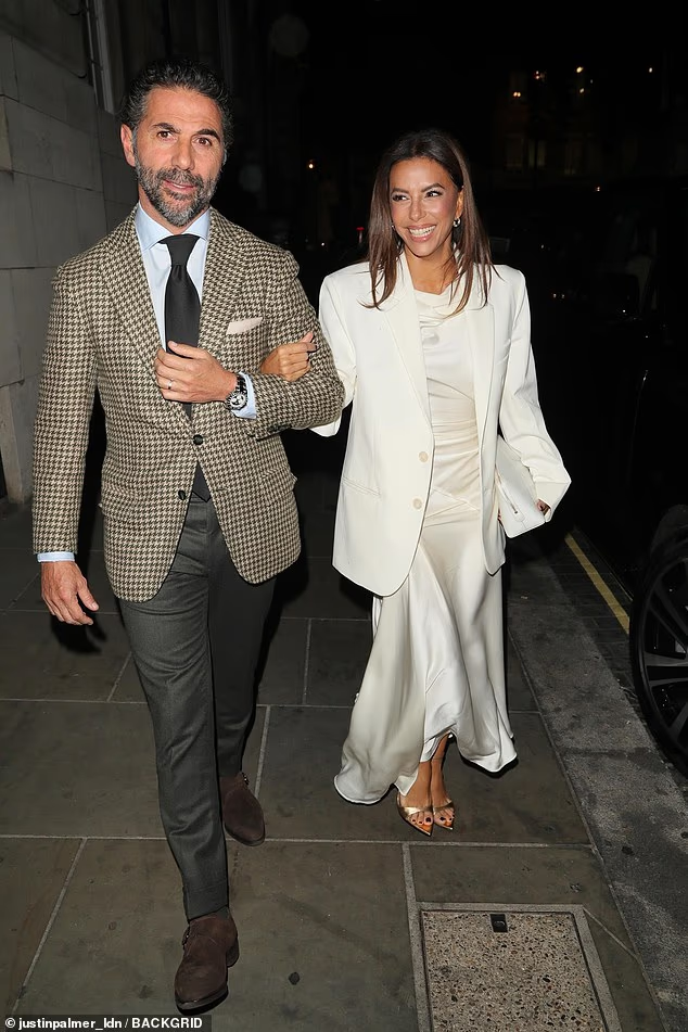 Victoria's best friend Eva Longoria - who is godmother to her daughter Harper - put on a glamorous display in a dazzling white gown as she linked arms with her husband José Bastón