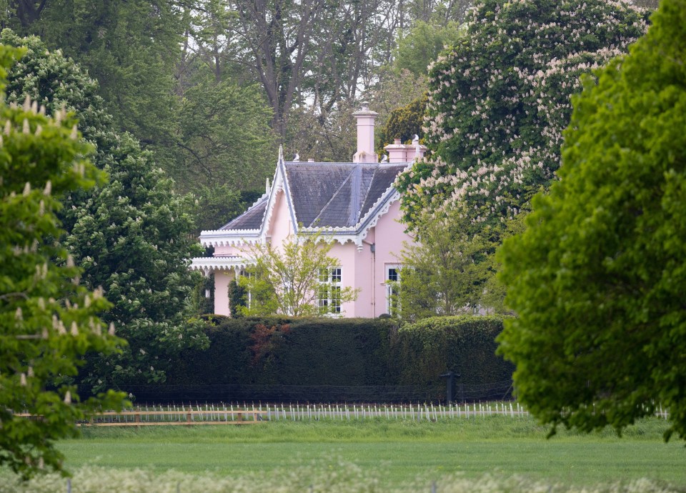 Adelaide Cottage at Windsor Castle, viewed from across a field.